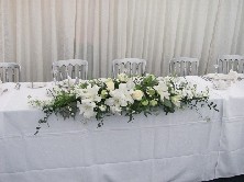 Classic white top table arrangement